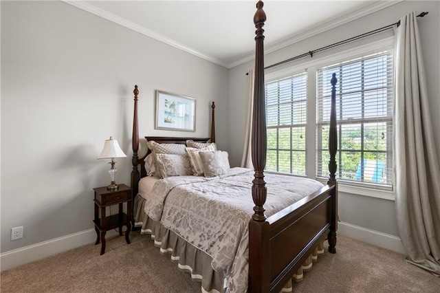 carpeted bedroom featuring baseboards and crown molding