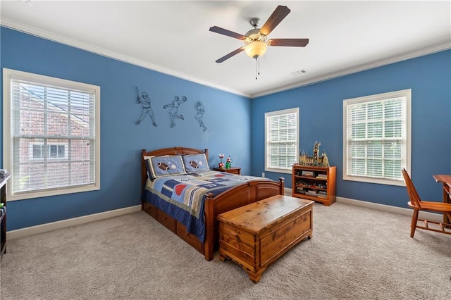 bedroom featuring crown molding, carpet flooring, baseboards, and visible vents