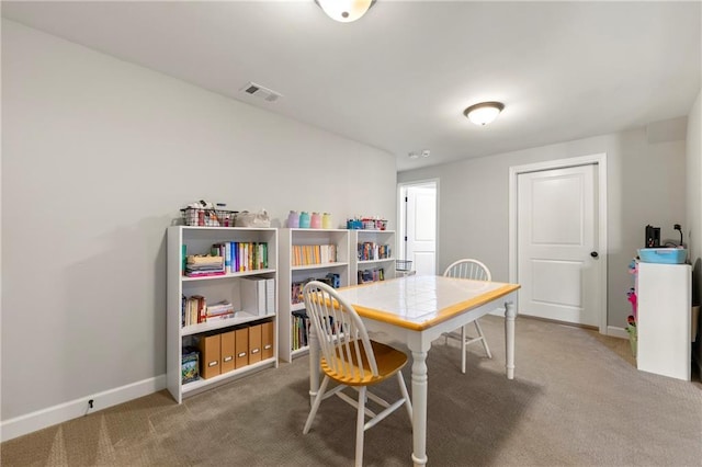game room featuring baseboards, visible vents, and carpet