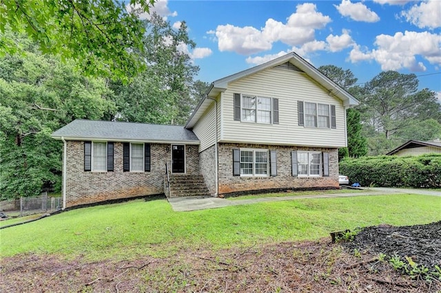 4444 Lisa Way NW, Lilburn, GA 30047 - split level home featuring brick siding
