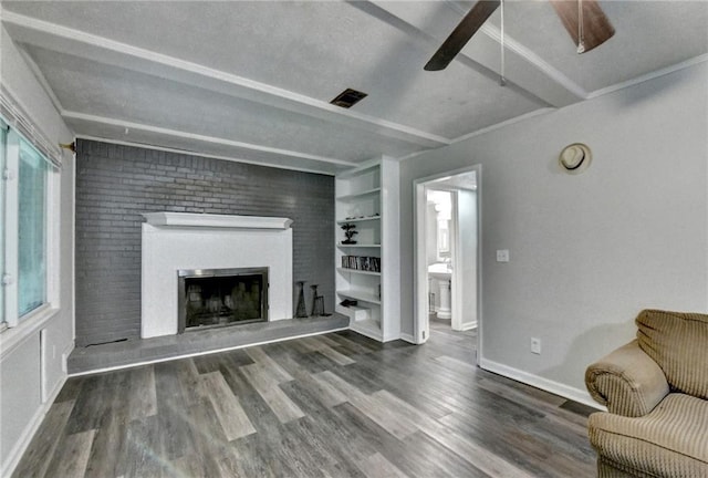 4444 Lisa Way NW, Lilburn, GA 30047 - living area with a ceiling fan, wood finished floors, and a fireplace with raised hearth
