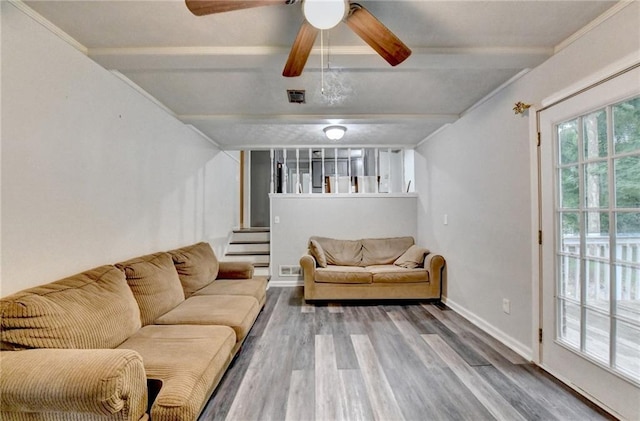 4444 Lisa Way NW, Lilburn, GA 30047 - living room featuring stairs, wood finished floors, ceiling fan, and beamed ceiling