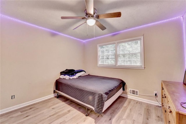 4444 Lisa Way NW, Lilburn, GA 30047 - bedroom featuring light wood-style flooring and ceiling fan