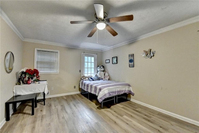 4444 Lisa Way NW, Lilburn, GA 30047 - bedroom featuring light wood finished floors, crown molding, a ceiling fan, and a textured ceiling