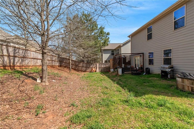 view of yard with fence