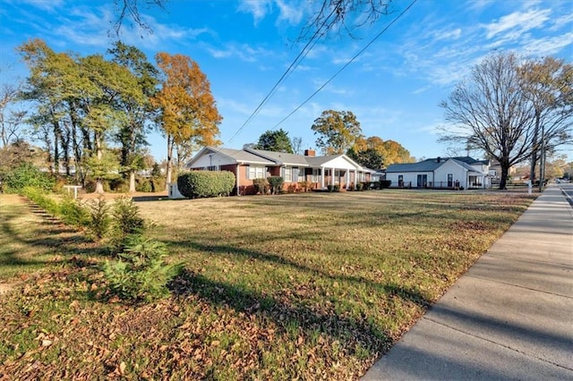 ranch-style house with a front yard