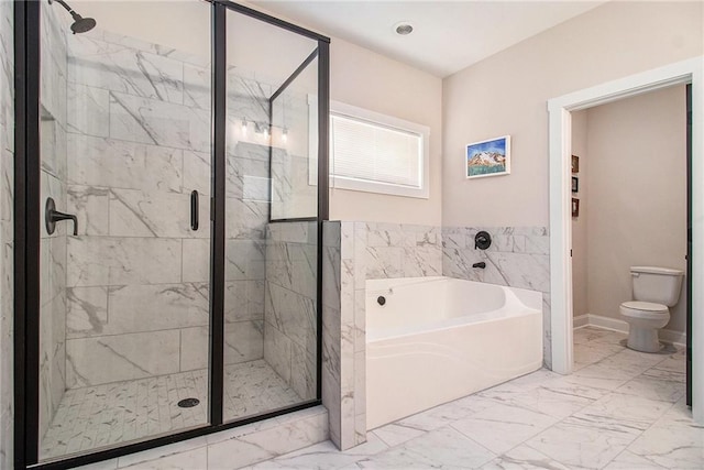 bathroom featuring marble look tiles, a garden tub, a shower stall, toilet, and baseboards