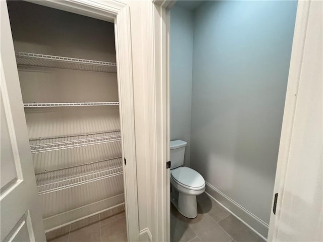 1005 Liberty Springs Dr, Woodstock, GA 30188 - bathroom featuring toilet and tile patterned flooring