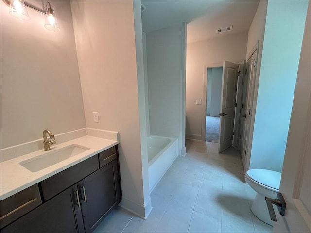 1005 Liberty Springs Dr, Woodstock, GA 30188 - bathroom featuring vanity, a bathtub, and tile patterned floors