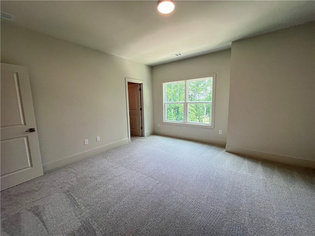 1005 Liberty Springs Dr, Woodstock, GA 30188 - carpeted empty room featuring baseboards