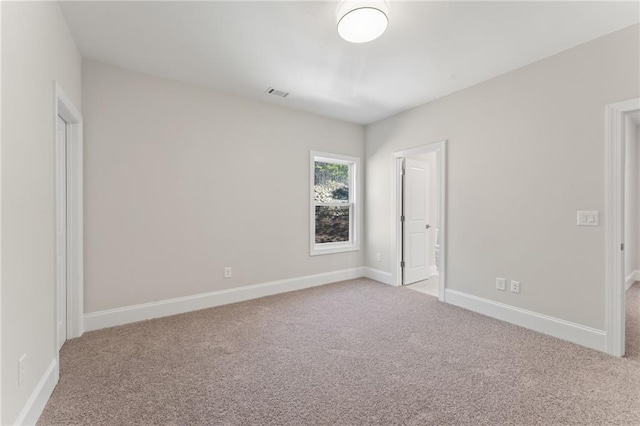 1005 Liberty Springs Dr, Woodstock, GA 30188 - unfurnished bedroom with carpet floors and connected bathroom