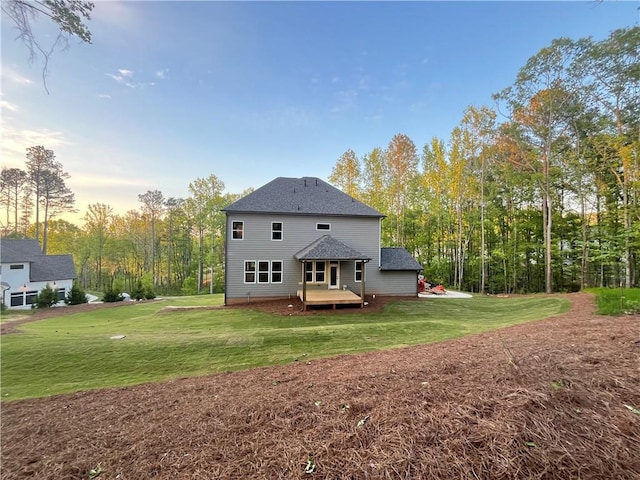 1005 Liberty Springs Dr, Woodstock, GA 30188 - rear view of property with a yard and a shingled roof