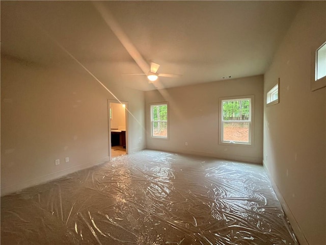 1005 Liberty Springs Dr, Woodstock, GA 30188 - unfurnished living room with a ceiling fan and baseboards