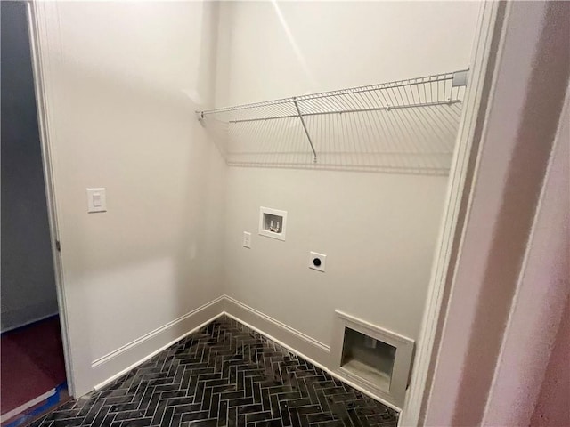 1005 Liberty Springs Dr, Woodstock, GA 30188 - laundry area with electric dryer hookup, washer hookup, and brick patterned flooring