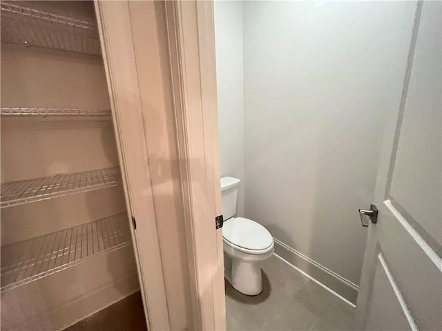 1005 Liberty Springs Dr, Woodstock, GA 30188 - bathroom featuring toilet and baseboards