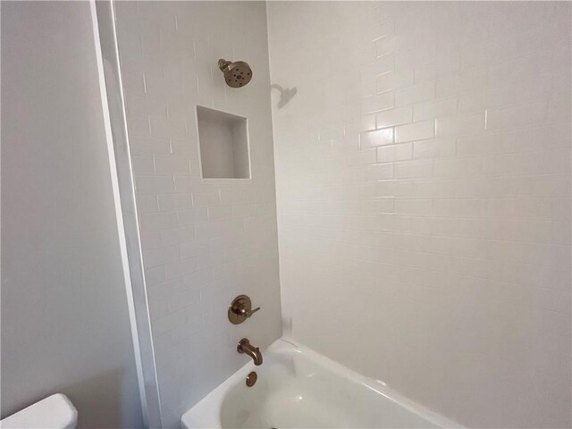 1005 Liberty Springs Dr, Woodstock, GA 30188 - bathroom with shower / tub combination and toilet