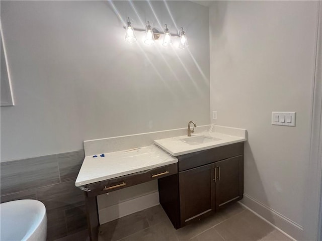 1005 Liberty Springs Dr, Woodstock, GA 30188 - full bath with vanity, tile patterned floors, a freestanding bath, and tile walls
