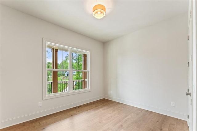 1005 Liberty Springs Dr, Woodstock, GA 30188 - spare room with light wood finished floors