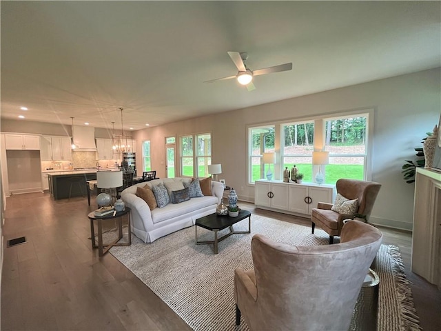 1005 Liberty Springs Dr, Woodstock, GA 30188 - living area featuring wood finished floors, recessed lighting, a ceiling fan, and a chandelier