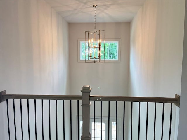 1005 Liberty Springs Dr, Woodstock, GA 30188 - stairs featuring a chandelier
