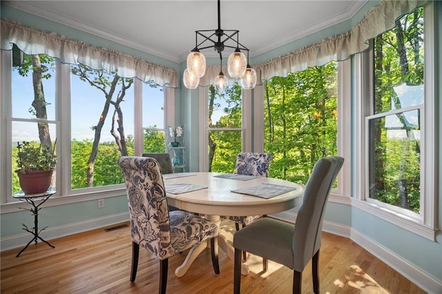 711 Wildcat Dr, Big Canoe, GA 30143 - sunroom with plenty of natural light and a chandelier
