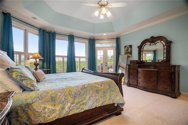 711 Wildcat Dr, Big Canoe, GA 30143 - carpeted bedroom with french doors, a tray ceiling, ornamental molding, ceiling fan, and recessed lighting