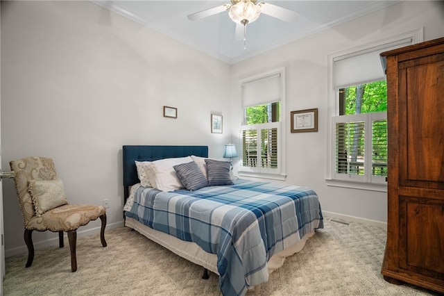 711 Wildcat Dr, Big Canoe, GA 30143 - bedroom with light colored carpet, ornamental molding, baseboards, and ceiling fan