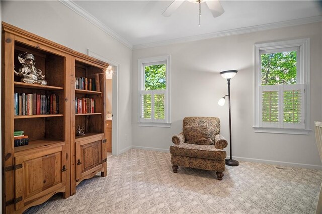 711 Wildcat Dr, Big Canoe, GA 30143 - sitting room with plenty of natural light, ceiling fan, carpet floors, ornamental molding, and baseboards