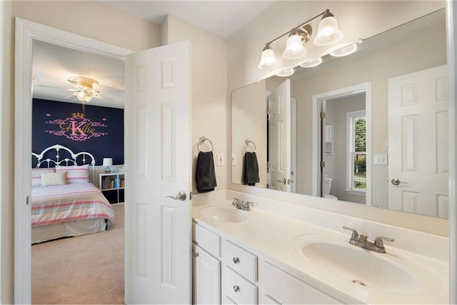 2740 Greymont Ct, Cumming, GA 30041 - ensuite bathroom featuring double vanity and a ceiling fan