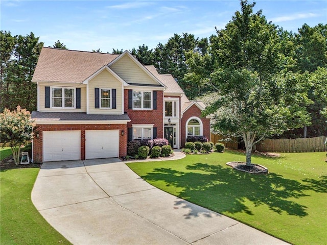 2740 Greymont Ct, Cumming, GA 30041 - view of front of house featuring an attached garage, concrete driveway, and brick siding