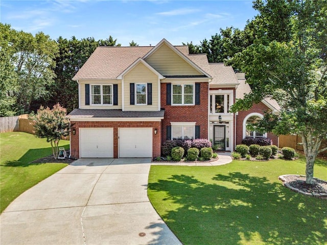 2740 Greymont Ct, Cumming, GA 30041 - view of front of property featuring an attached garage, concrete driveway, brick siding, and roof with shingles