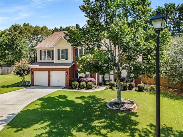 2740 Greymont Ct, Cumming, GA 30041 - view of front of home with an attached garage, brick siding, and driveway