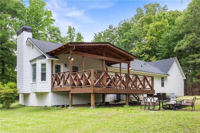 511 Laird Rd, Hiram, GA 30141 - back of property with roof with shingles, a yard, a chimney, a deck, and cooling unit