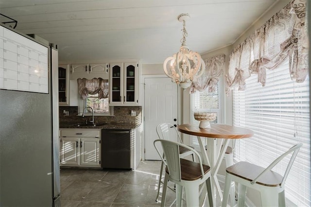 511 Laird Rd, Hiram, GA 30141 - kitchen featuring dishwashing machine, a sink, decorative backsplash, and plenty of natural light