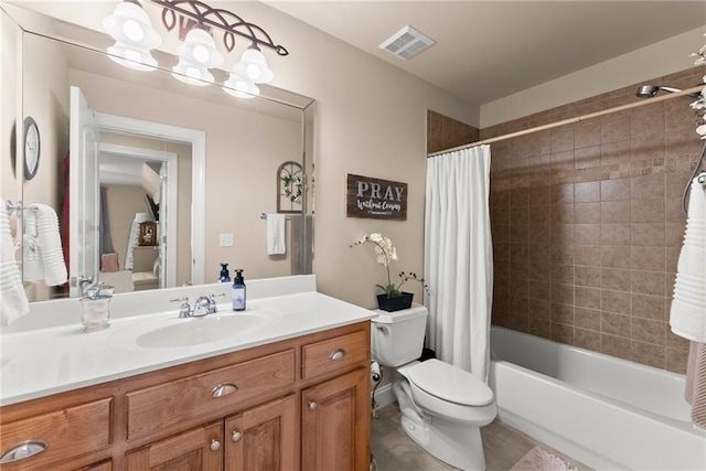 full bathroom with tile patterned flooring, vanity, shower / tub combo, and toilet