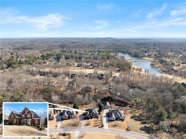 drone / aerial view featuring a water view