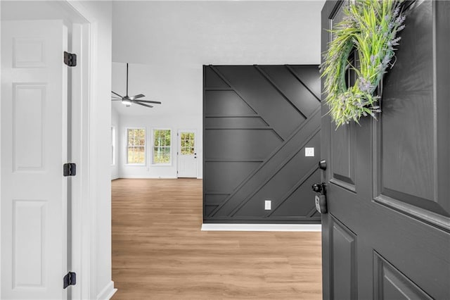 entrance foyer with light hardwood / wood-style floors and ceiling fan