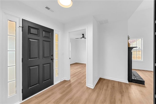 foyer with light wood-type flooring