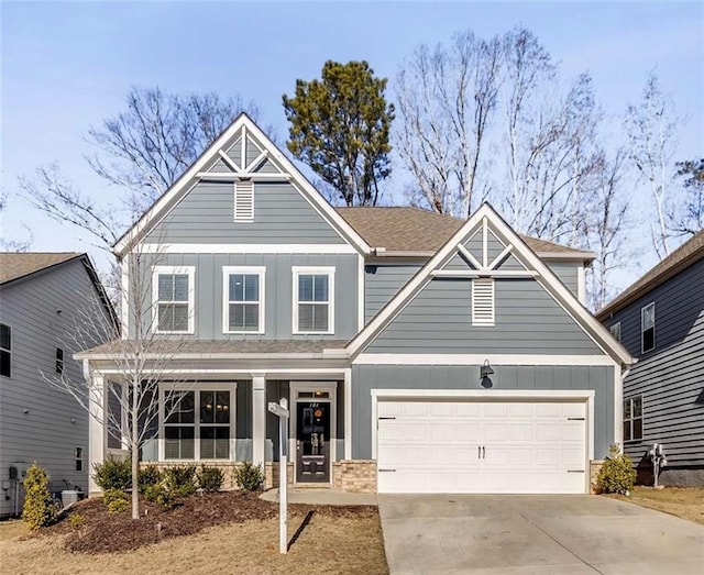 craftsman house with a garage