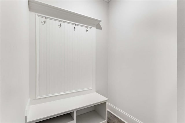 mudroom with wood-type flooring