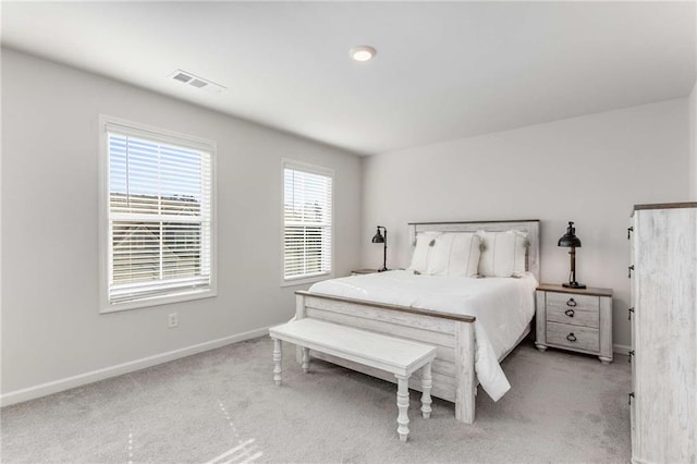 bedroom with light carpet