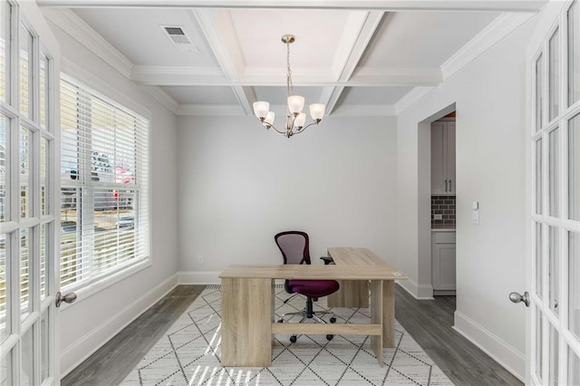 office space featuring a chandelier, beam ceiling, crown molding, and coffered ceiling