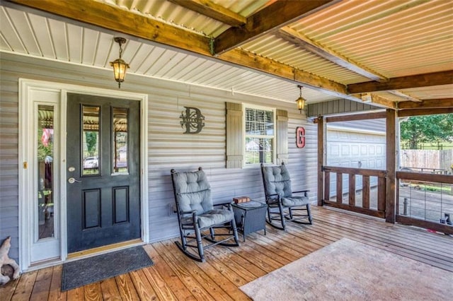 doorway to property with a garage