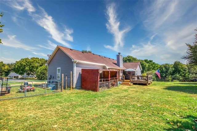 back of property with an outdoor structure