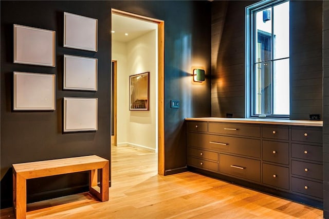 bathroom with vanity and hardwood / wood-style flooring