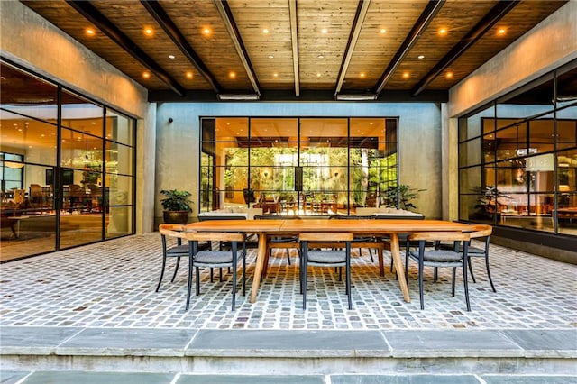 interior space with beamed ceiling and wood ceiling