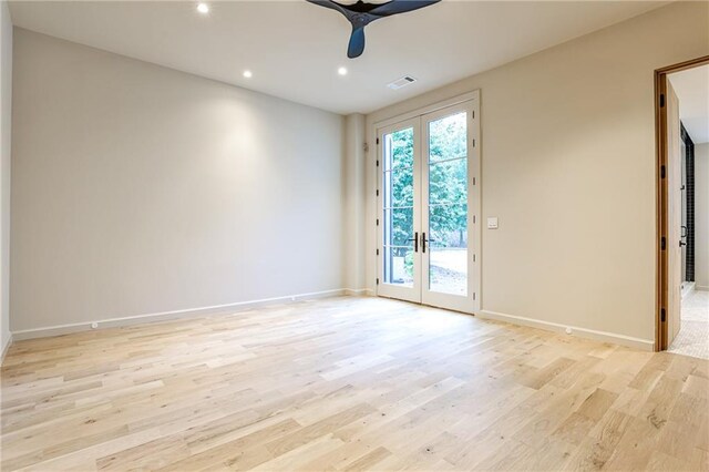 walk in closet with light hardwood / wood-style floors