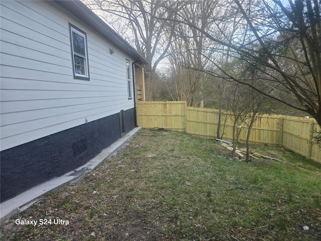 view of yard with fence