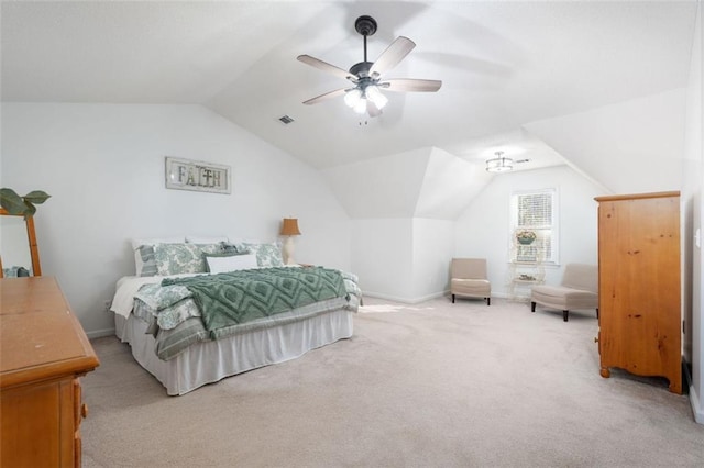 bedroom featuring ceiling fan, light carpet, and lofted ceiling