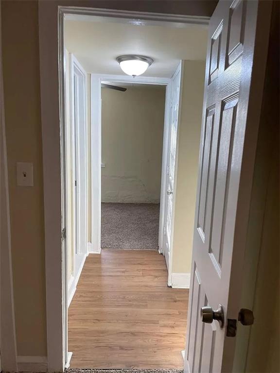 2771 Mann Rd, Winston, GA 30187 - corridor featuring light wood finished floors
